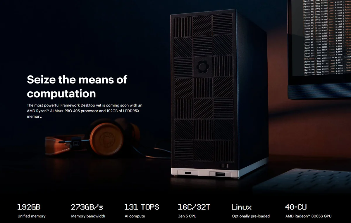 A Framework Desktop with AMD Ryzen AI Max+ PRO 495 processor and 192GB LPDDR5X memory is next to a monitor showing code, alongside text reading 'Seize the means of computation.'