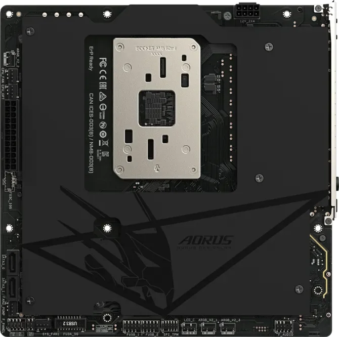 A motherboard featuring the AORUS logo with a visible 'SOCKET AM5' mounting plate and various port labels, including 'CANICES-003(B)/NMB-003(B)' and 'ErP Ready'.