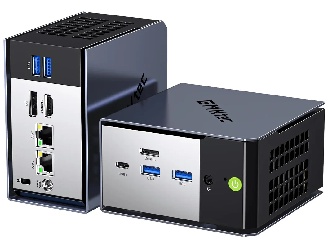 Two compact GMKtec mini PCs featuring USB, HDMI, DP, LAN, and USB4 ports, with power buttons and ventilation grills visible.
