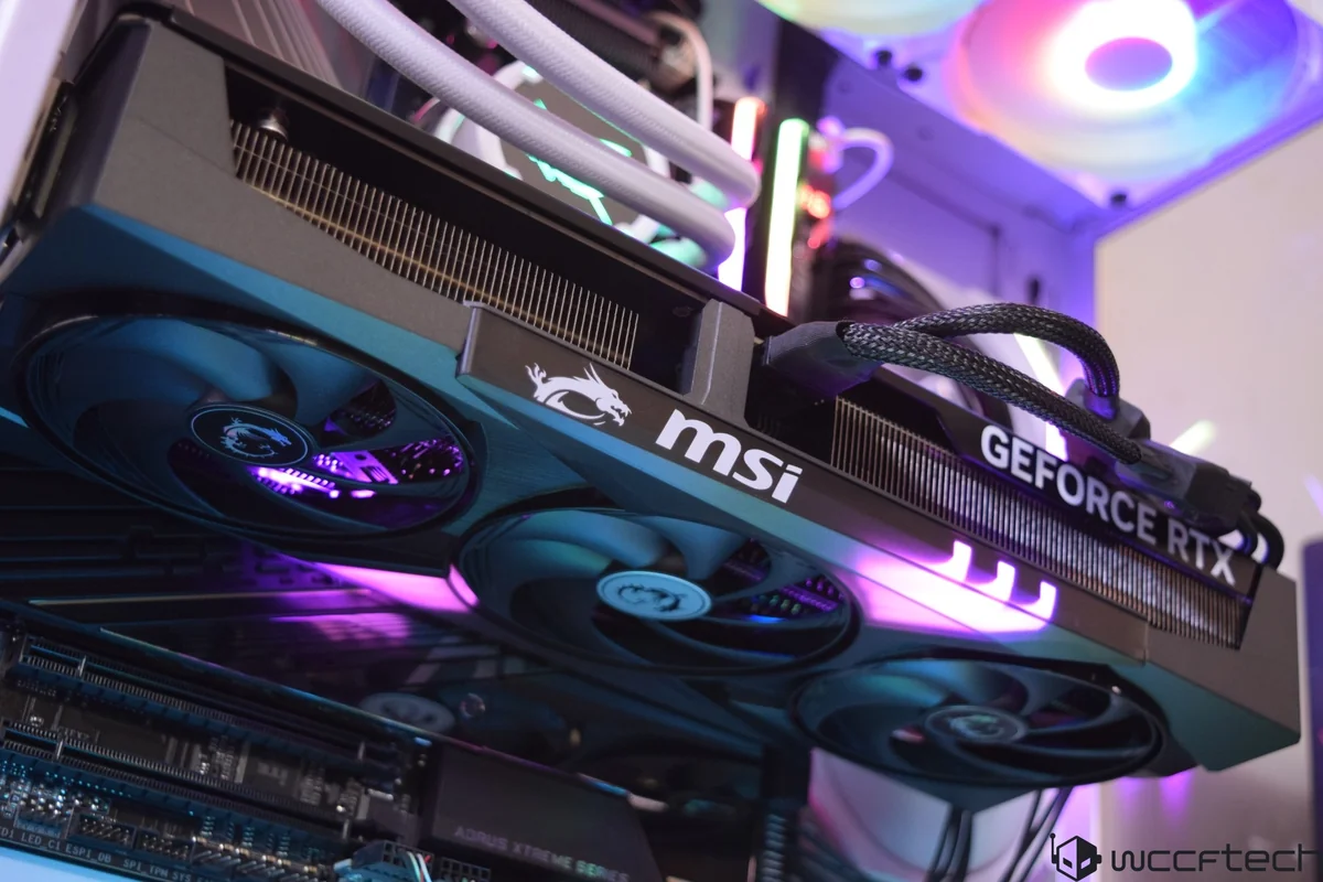 An MSI GeForce RTX graphics card installed in a PC with glowing RGB lighting.