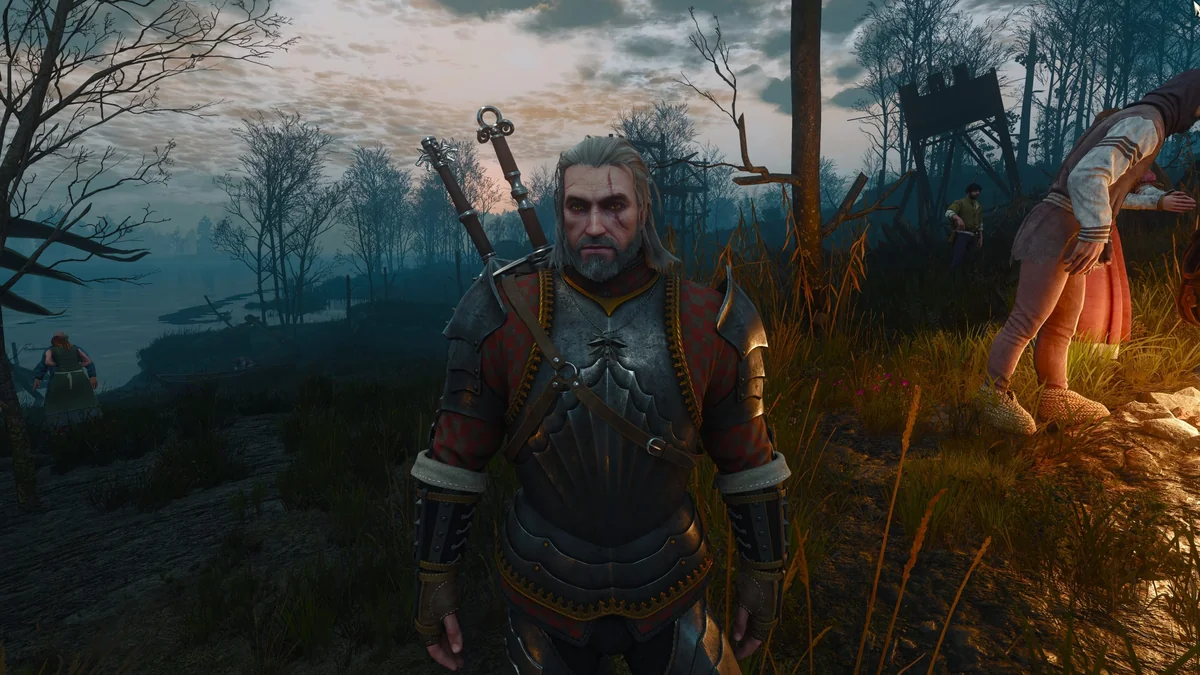 The character Geralt of Rivia stands in armor by a campfire in a wooded area at dusk in The Witcher 3: Wild Hunt.