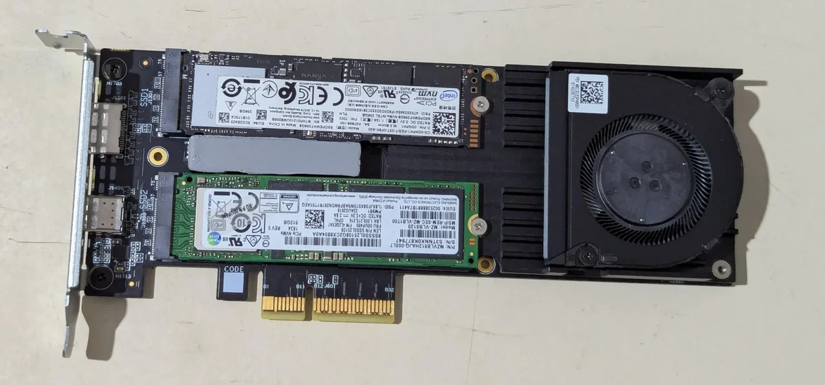 A PCIe card with two M.2 SSDs and a cooling fan is displayed, featuring Intel NVMe branding on the SSDs.