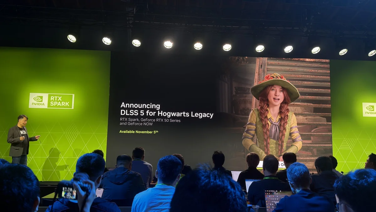 A presenter on stage with a screen showing 'Announcing DLSS 5 for Hogwarts Legacy' and 'Available November 5th,' alongside an image of a character from the game.