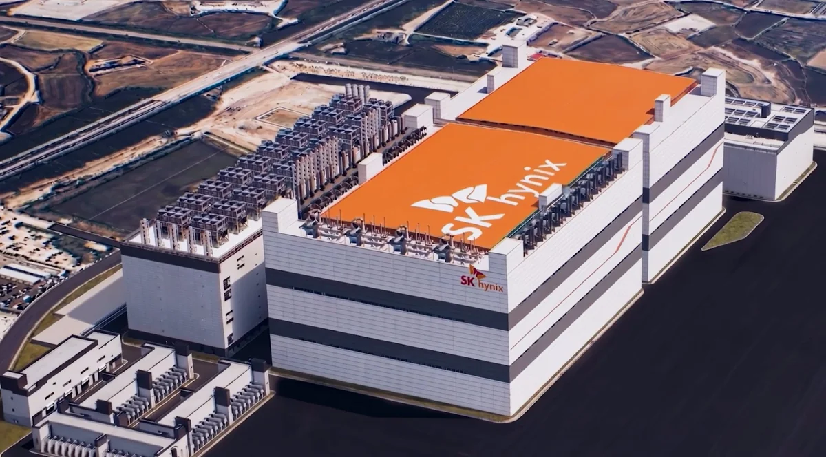 An aerial view of the SK hynix semiconductor manufacturing plant with an orange roof logo.